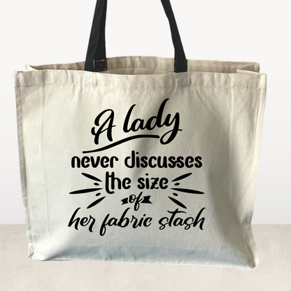 A lady never discusses the size of her fabric stash, Tote Bag